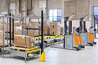 Automatyzacja pracy magazynu w oparciu o wózki AGV – tu automatyczne wózki podnośnikowe STILL EXV iGo systems wykorzystane w firmie Danfoss.